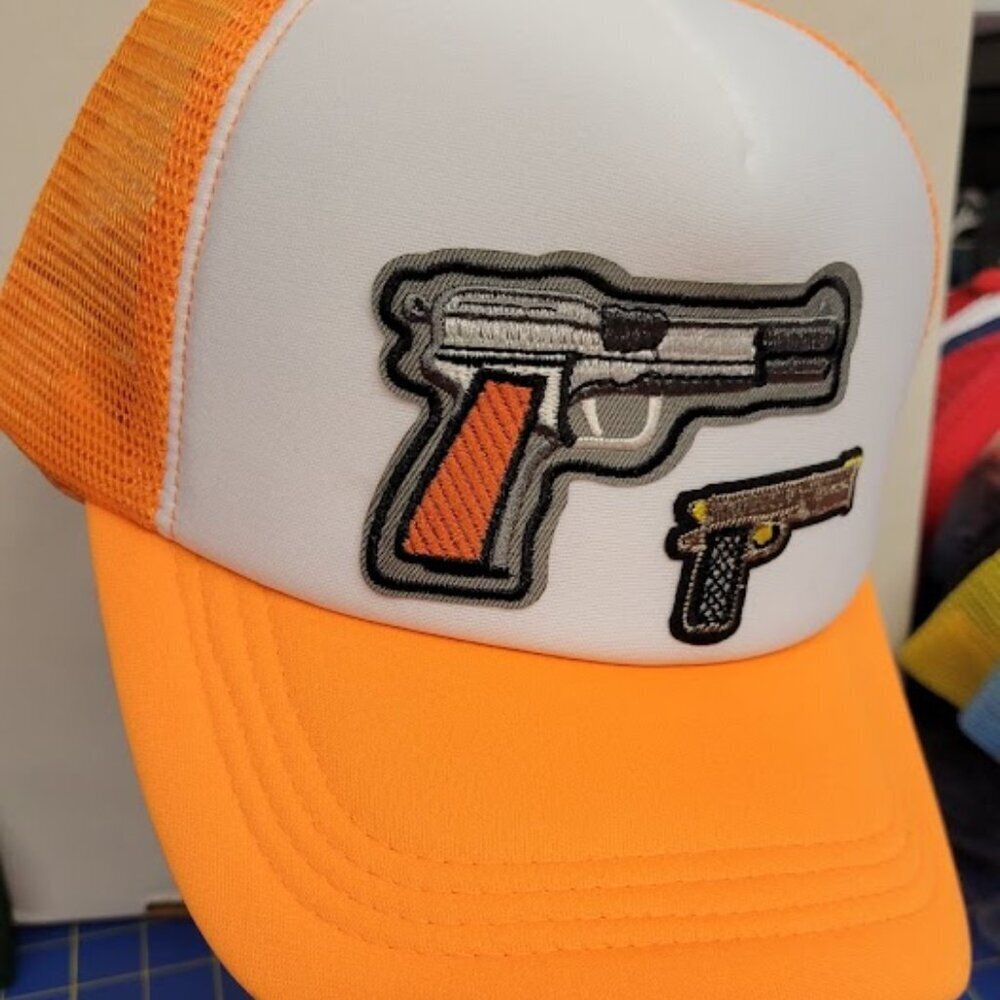 Orange Trucker Hat w Applique Patch Guns